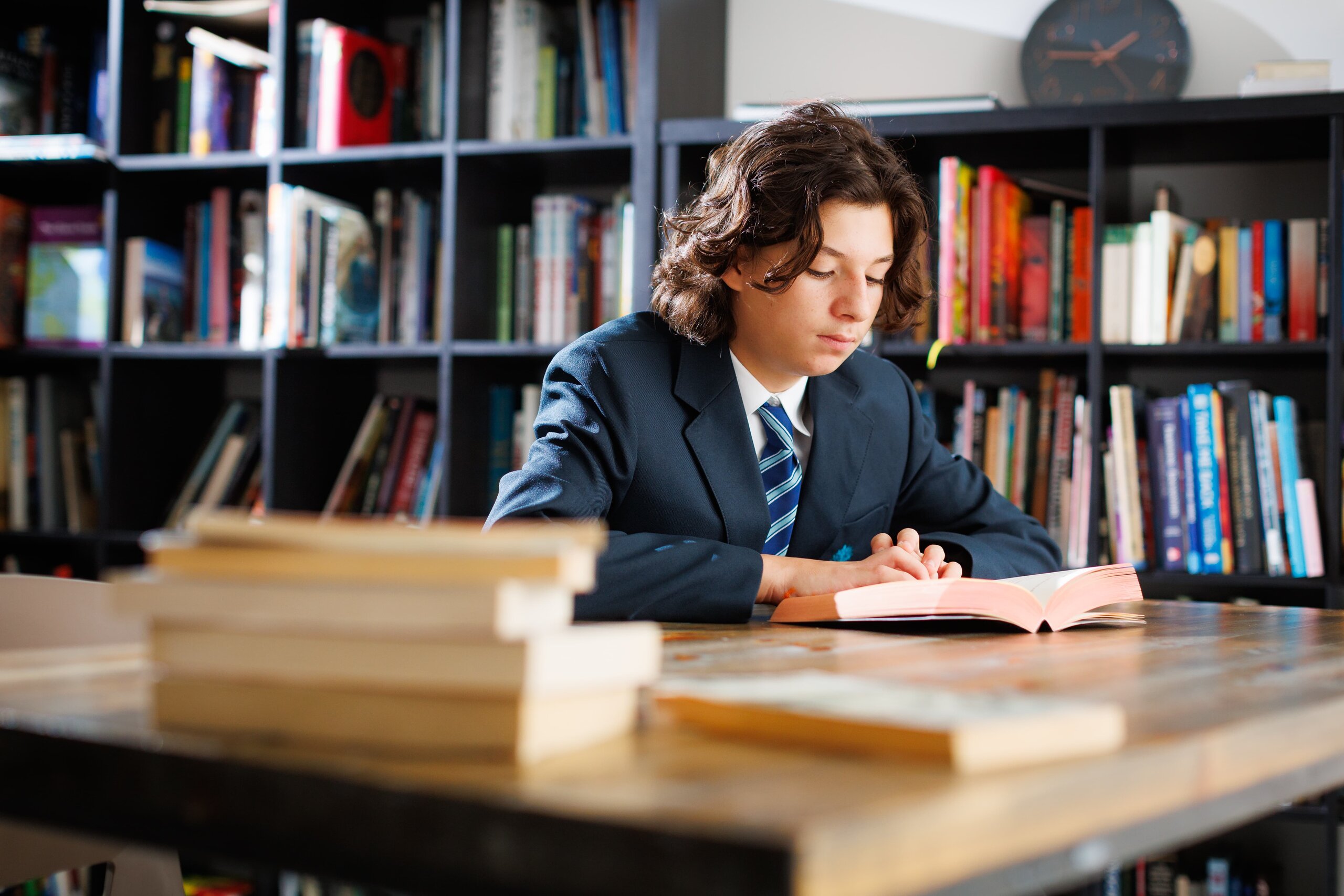 A student reading in the school library